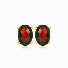 Garnet oval stud earrings in 14kt yellow gold