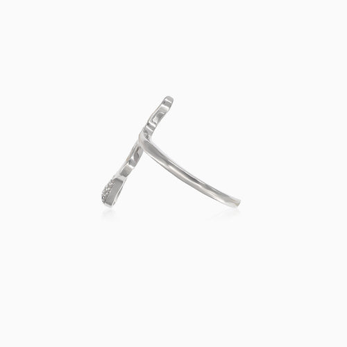 Eleganter Silberring in Schlangenform mit dunkelblauen Augen