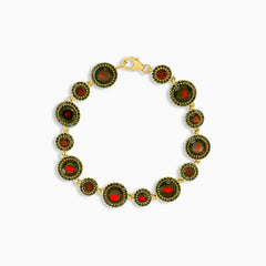 Pulsera artesanal de granate en oro amarillo