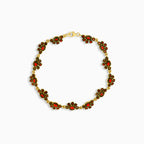 Gold Garnet Bracelet with Floral Accents