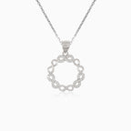 Colgante de plata en forma de círculo con infinito y circonitas cúbicas
