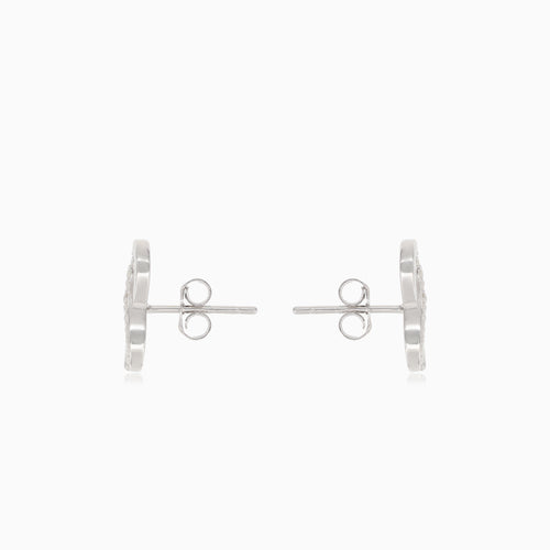 Silver infinity earrings with half-covered cubic zirconia