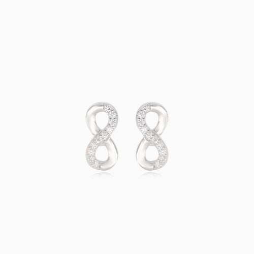 Silver infinity earrings with half-covered cubic zirconia