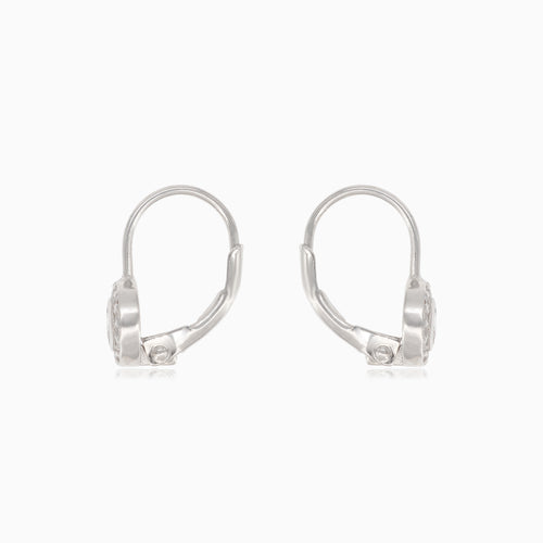 Silver earrings with large cubic zirconia, surrounding smaller cubic zirconia