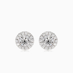 Silver earrings with central and surrounding cubic zirconia