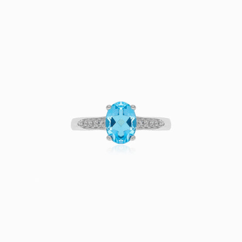 Blue topaz and cubic zirconia silver ring