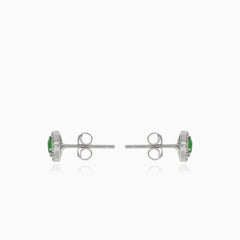 Silver earrings with synthetic emerald and surrounding cubic zirconia