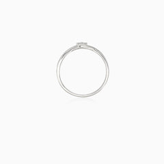 Sparkling white gold engagement ring with unique twist