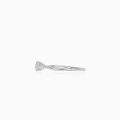 Sparkling white gold engagement ring with unique twist