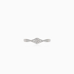 Sparkling white gold engagement ring with unique twist