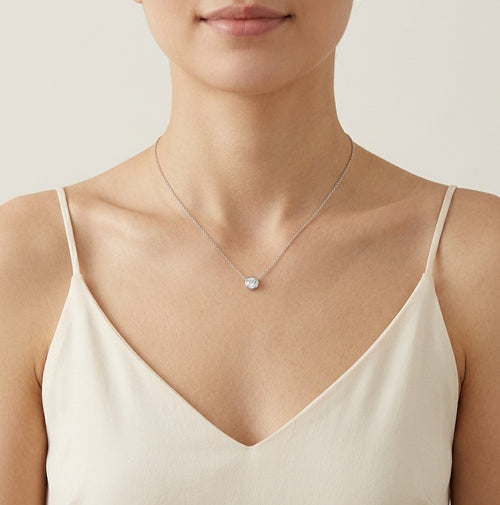 White gold necklace with delicate round solitaire