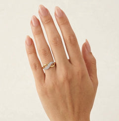 Infinity gold ring with two cubic zirconia rows