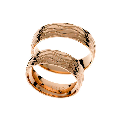 Rose gold wedding ring with wave lines