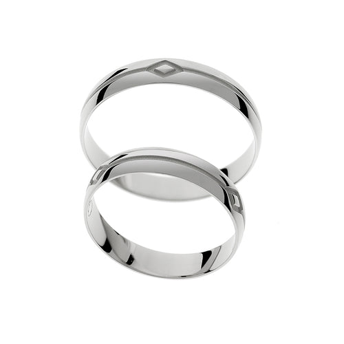 Elegant white gold wedding ring with unique engraving