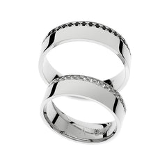 Bagues de mariage en or blanc avec pierres serties en bordure