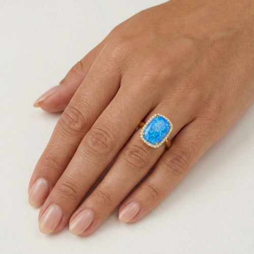 Massiver Goldring mit Cabochon Blauopal