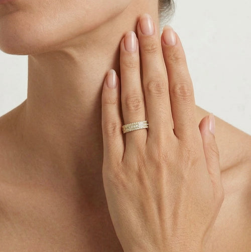 Triple gold ring with zircons