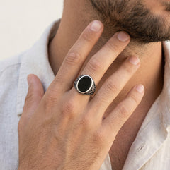 Silver men ring with dark onyx center