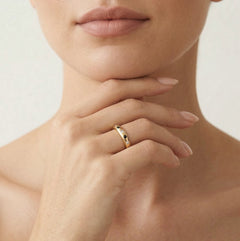 Golden radiance with white zirconia and black onyx ring