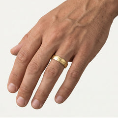 Wedding yellow gold rings with curved line