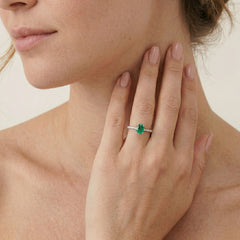 Classic white gold diamond and emerald ring