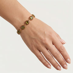 Pulsera de oro con moldavita y granate encantadora