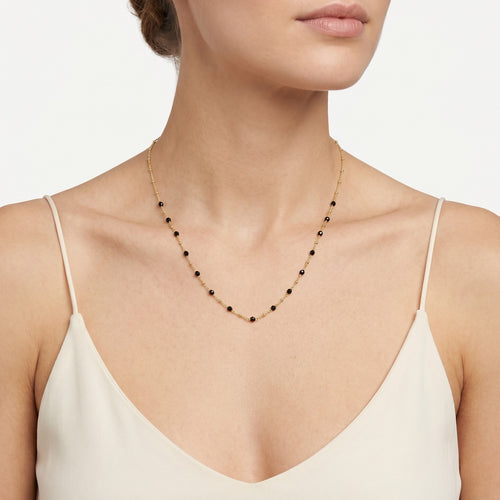Yellow gold necklace with black onyx