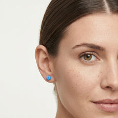 Blue opal stud earrings in gold