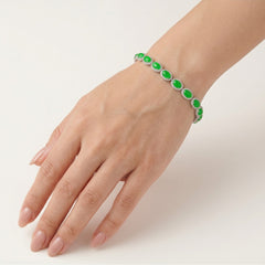 Pulsera halo de plata con esmeralda talla ovalada