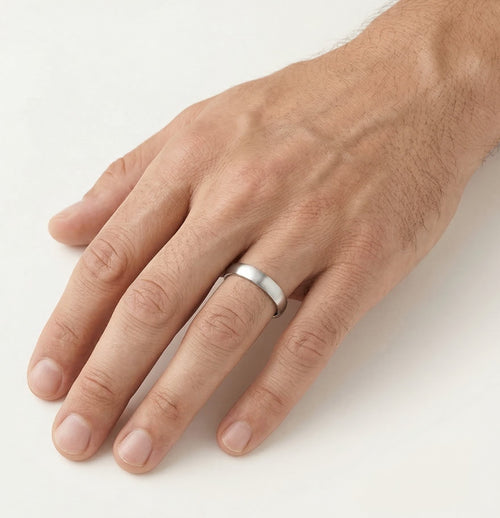 Matte finish white gold wedding ring with princess cut stone