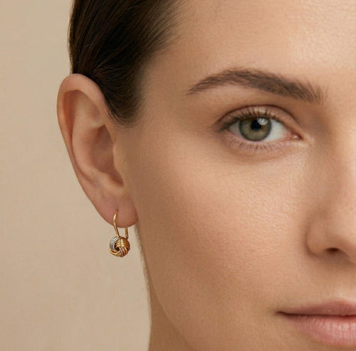 Pendientes colgantes anudados de tres oros