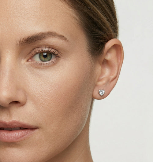 White gold tiny cubic zirconia heart stud earrings