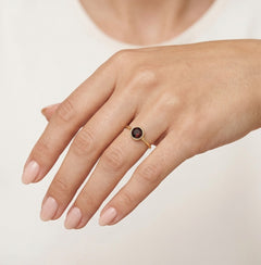 Elegant garnet round fine step cut women ring