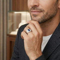 Silver halo ring with sapphire center