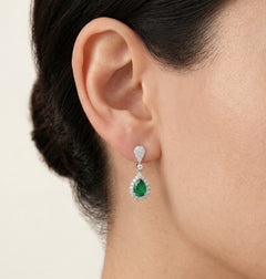 White gold diamond and emerald drop earrings