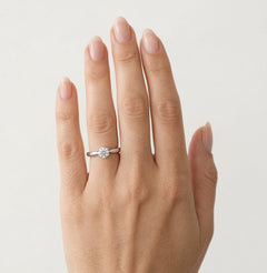 White gold ring with round diamond
