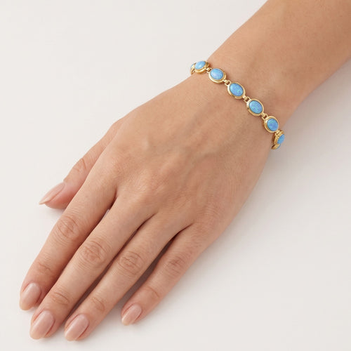 Klassisches Armband aus Gelbgold mit blauen Opalen