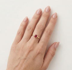 Rose gold ring with round ruby