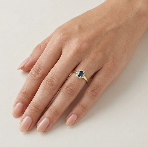 Bold oval blue quartz gold ring