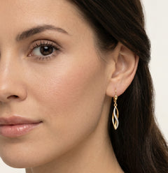 Yellow white gold dangling twisted earrings