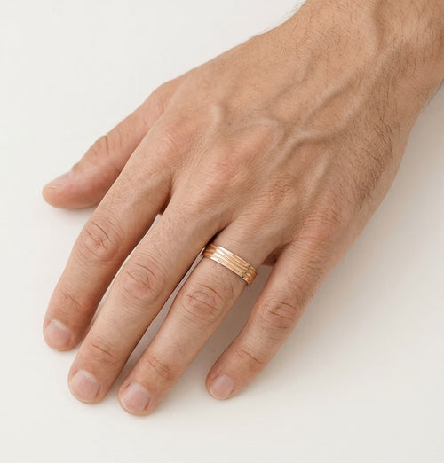 Classic rose gold wedding ring with carved lines