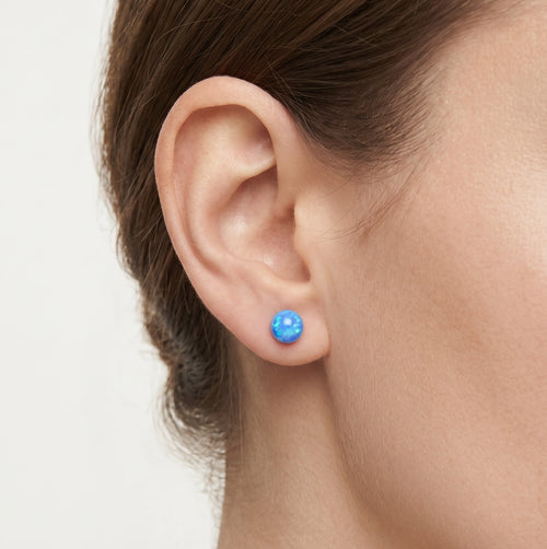 Blue opal stud earrings in gold