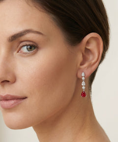 Silver earrings with synthetic ruby and cubic zirconia accents