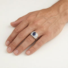 Silver halo ring with sapphire center