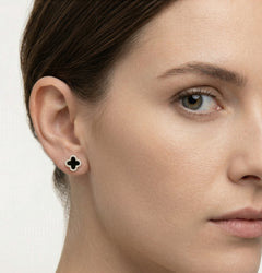 Silver four-leaf clover earrings with onyx