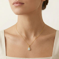 Pear-cut cubic zirconia yellow gold pendant