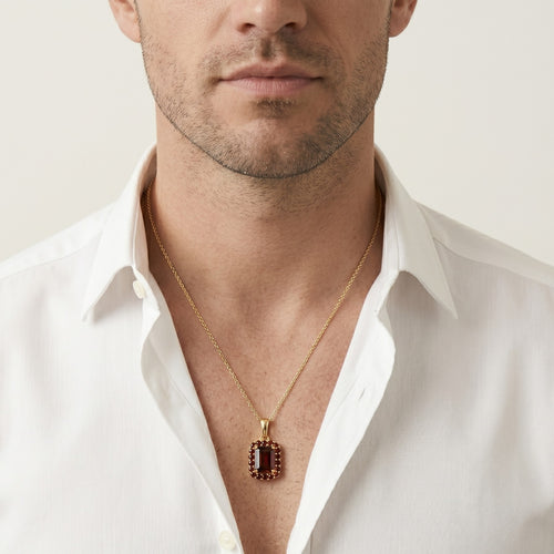 Harmony of shapes gold garnet pendant