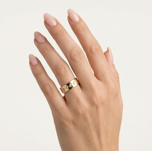 Yellow gold wedding ring with leaf detail