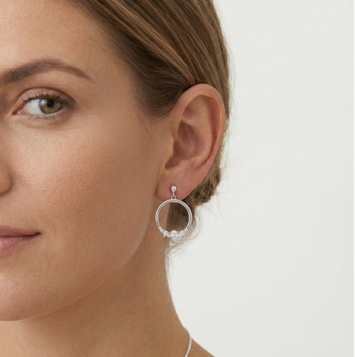 Silver stud earrings dangling circle with decoration
