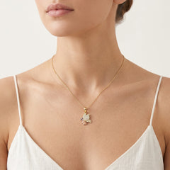 Pendentif papillon en or avec fleur